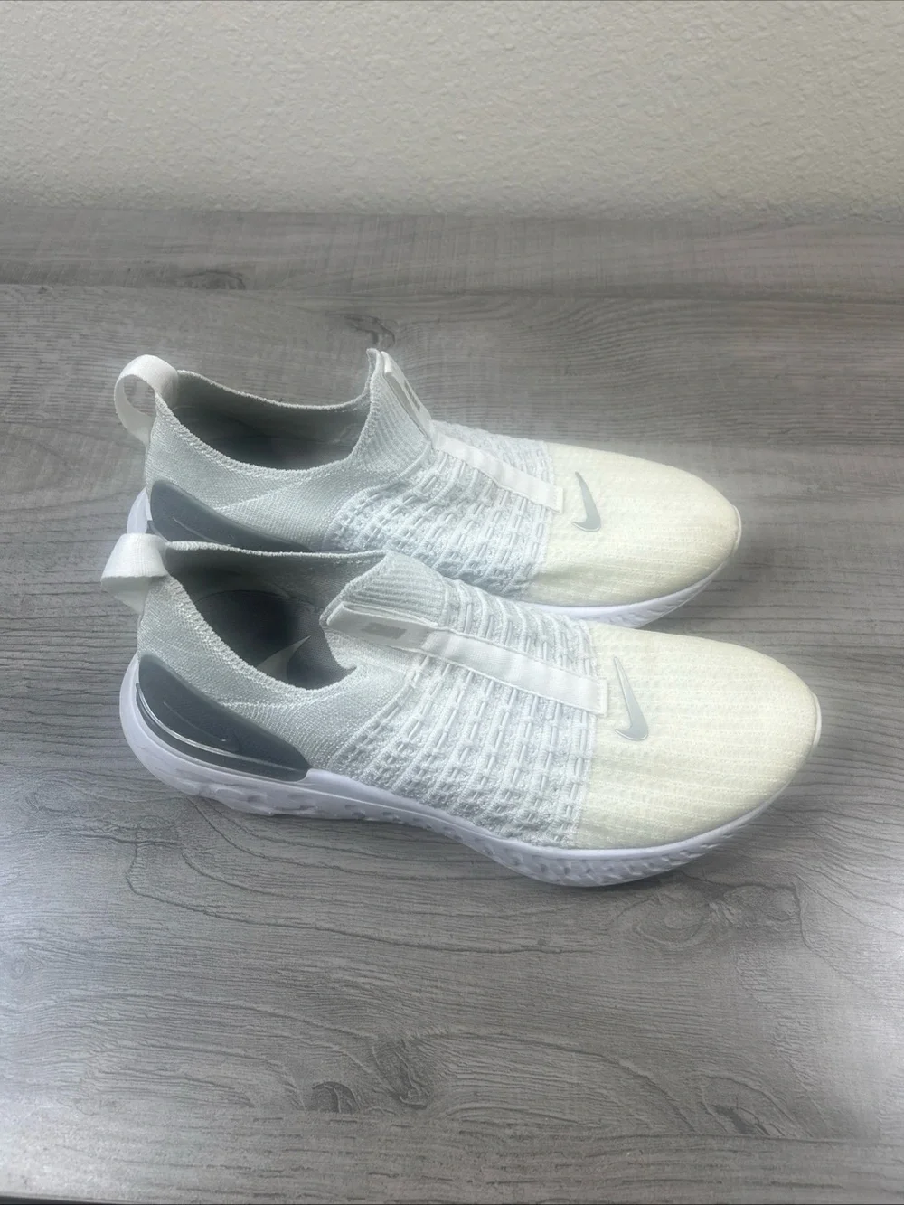 Nike Women’s White Knit Slip-On Sneakers with Gray Accents